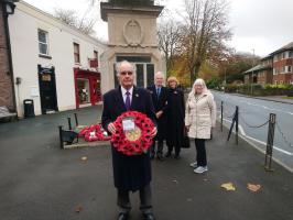 Peter JW Noble, MBE, Past District Governor laying wreath. November 2020